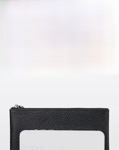 Litchi pattern leather pouch with silver zipper shown next to an iPhone for size comparison