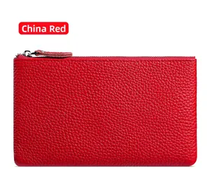 Detail of China Red lychee grain leather clutch with high-quality metal zipper