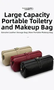 Genuine leather toiletry bags in beige, burgundy and black with metal top handle