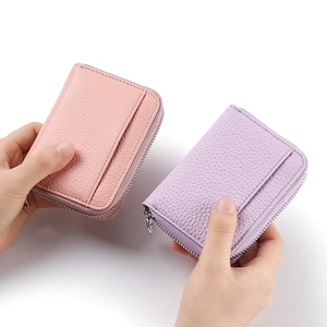 Mini portamonete in vera pelle con RFID e slot per schede nei colori rosa e viola