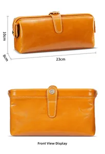 Dimensioni dettagliate della borsa da toilette in pelle con fibbia argentata da 23 cm