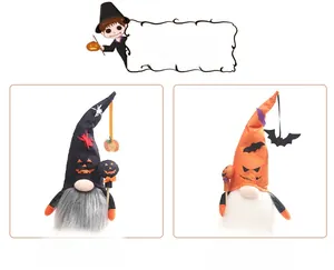 Close-up of Halloween gnomes with LED lights, pumpkin hats and pointed cap details