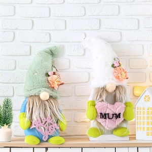 Close-up of Mother's Day gnomes featuring Love You and MUM embroidery on soft plush