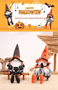 Close-up of two long-legged Halloween gnomes with Boo banner and broom on wooden stool