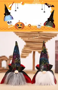 Close-up of Halloween glowing vampire gnomes with spider web hats and LED lights