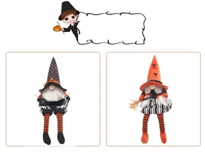 Detail of Halloween gnomes with broom and BOO banner showing fabric texture and design