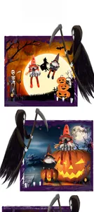Detail of Halloween gnome dolls featuring striped long legs and a BOO themed banner