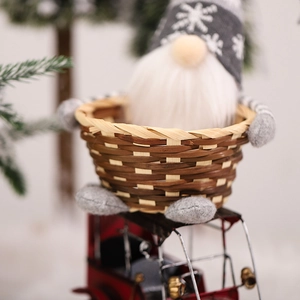 Christmas gnome doll in woven bamboo candy basket with snowflake knit hat for holiday decor