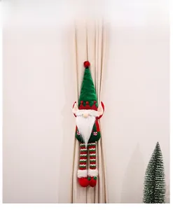 Detail of Christmas gnome curtain tieback showing festive plush design on curtains