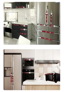 Close-up of Christmas gnome refrigerator handle covers in festive red and grey knit fabric