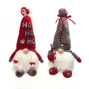 Set of two Christmas gnomes with LED lights featuring HO HO HO and NOEL holiday slogans