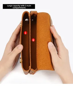 Detail view of double main compartments in crazy horse leather waist bag for two phones