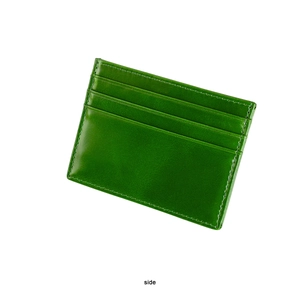 Detailed side view of green oil wax leather card holder with multiple card slots