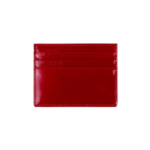 Close-up of bright red waxed leather card holder showing multi-slot details and fine stitching
