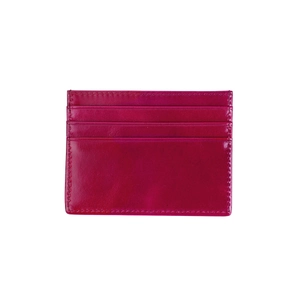 Detail showing magenta oil wax leather texture and reinforced stitching of the card holder