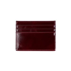 Detail of burgundy wax leather card holder showing three slots and fine stitching