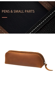Close-up of the vintage leather pencil case with metal zipper and leather pull detail