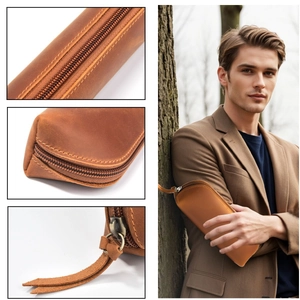 Handmade crazy horse leather pencil case with metal zipper and fringe in outdoor setting