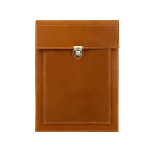 Detail of retro brown leather laptop sleeve with silver metal buckle and yellow stitching