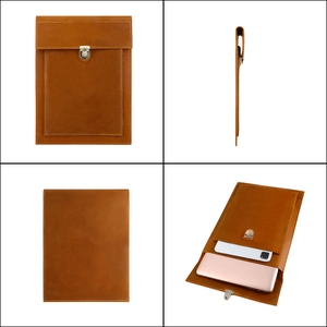 Vintage brown leather laptop sleeve with front pocket and retro metal buckle closure