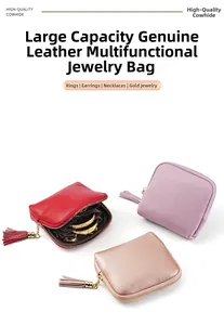 Close-up of premium cowhide jewelry organizers with zipper closure and tassel detail