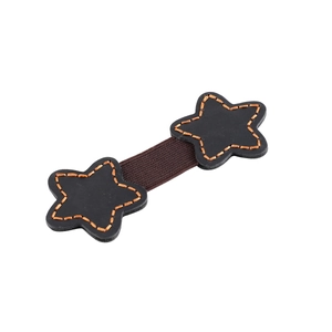 Detail of star-shaped crazy horse leather magnetic clips with orange contrast stitching