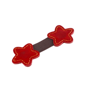 Detailed view of red leather star hairband with yellow hand-stitched edges and brown strap