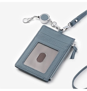 Blue leather ID holder with zipper pocket, card slots and retractable metal lanyard