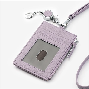 Detail view of lavender leather ID badge holder with zipper pocket and retractable cord