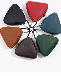 Group display of colorful crazy horse leather triangle coin purses with metal carbines