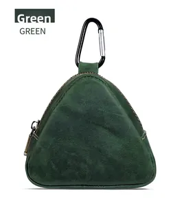 Detail of dark green crazy horse leather coin purse with metal carabiner and zipper closure