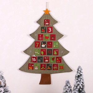 Christmas tree advent calendar in green felt with 25 numbered pockets for wall hanging decor