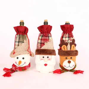Set of 3 Christmas wine bottle covers featuring snowman, Santa, and reindeer designs