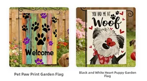 Detail view of pet-themed garden flags with cat and dog paw prints on black metal hangers