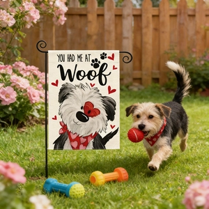 Linen garden flag with dog heart print and YOU HAD ME AT WOOF text in yard
