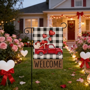 Detail of Valentine's buffalo plaid garden flag with red truck and welcome message