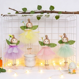 Set of four handmade fairy dolls with mesh skirts and wings for Easter and spring decor