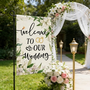 Detail of linen wedding garden flag with floral design and Welcome To Our Wedding text