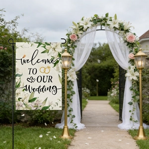 Linen garden flag with 'Welcome To Our Wedding' text and black metal stand for outdoor decor