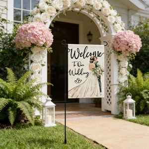 Linen wedding garden flag featuring welcome text and couple illustration on a metal stand