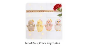 Close-up of four colorful plush Easter chicks with delicate floral and bow decorations
