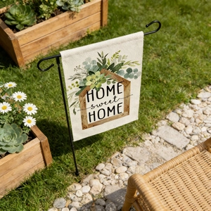 Close-up of linen garden flag with Home Sweet Home text and succulent plant illustration