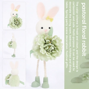 Detail view of plush Easter fairy rabbit ornament with green flower and woven rope legs