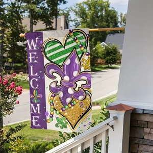 Detail of a Mardi Gras welcome garden flag with beads and fleur-de-lis on a wooden pole