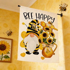 Detail of garden flag featuring gnome, sunflowers, and 'BEE HAPPY' text on linen fabric