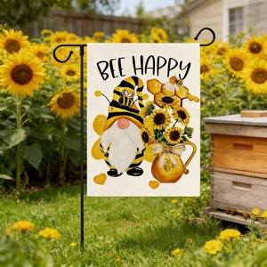Outdoor Bee Happy garden flag with gnome and sunflower design on a black metal stand