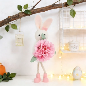 Detail of Easter bunny ornament with plush body, pink peony flower and rope legs