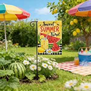 Macro shot of Sweet Summer Time garden flag featuring watermelon and lemons in a sunny orchard
