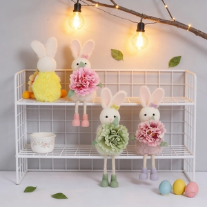Four long-legged Easter bunny plush ornaments holding colorful flowers on a display shelf