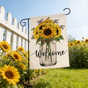 Close-up of linen garden flag with sunflowers and Welcome text on a black metal stand